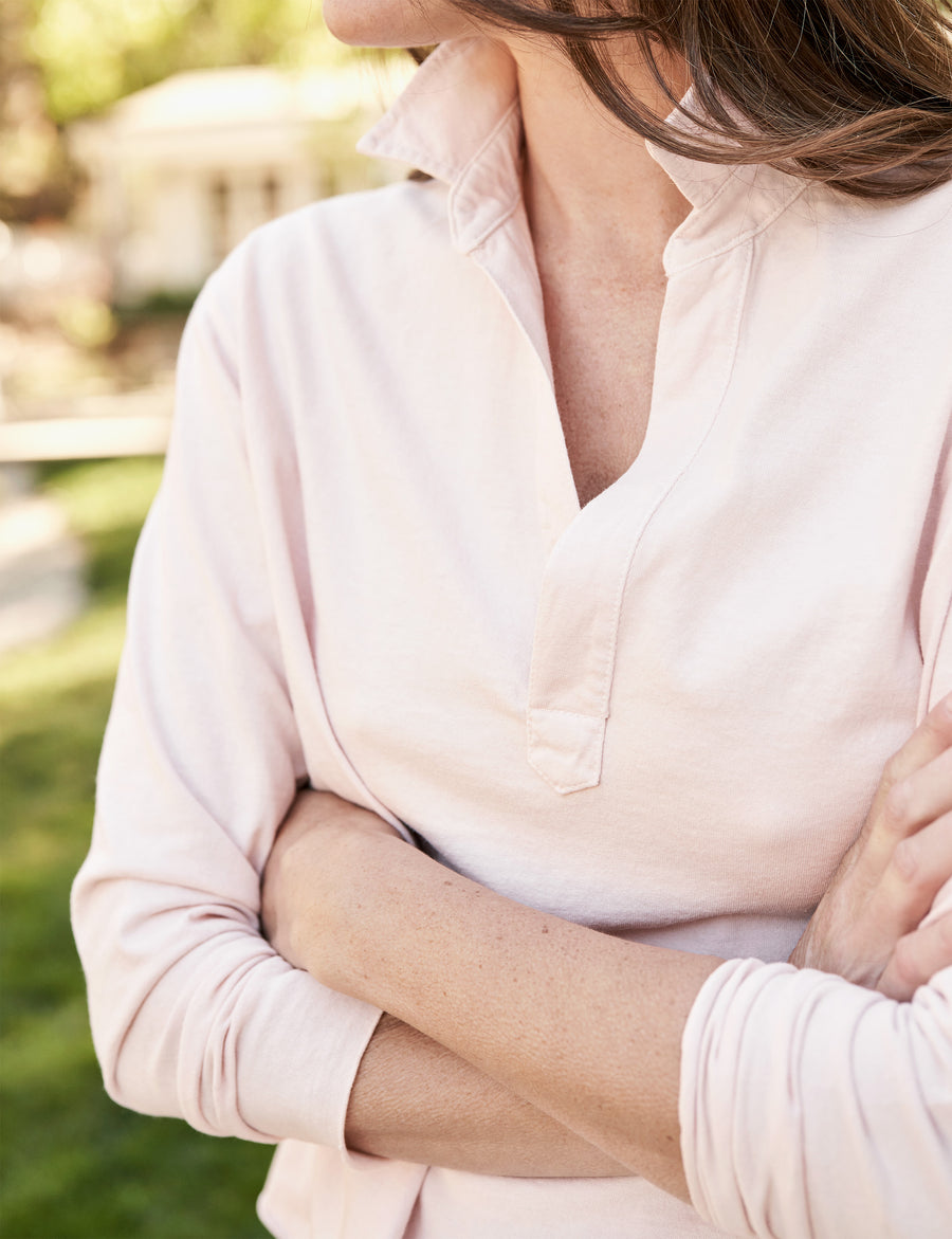 Collar and arms of person wearing Vintage Rose Frank & Eileen Patrick Popover Henley in Heritage Jersey